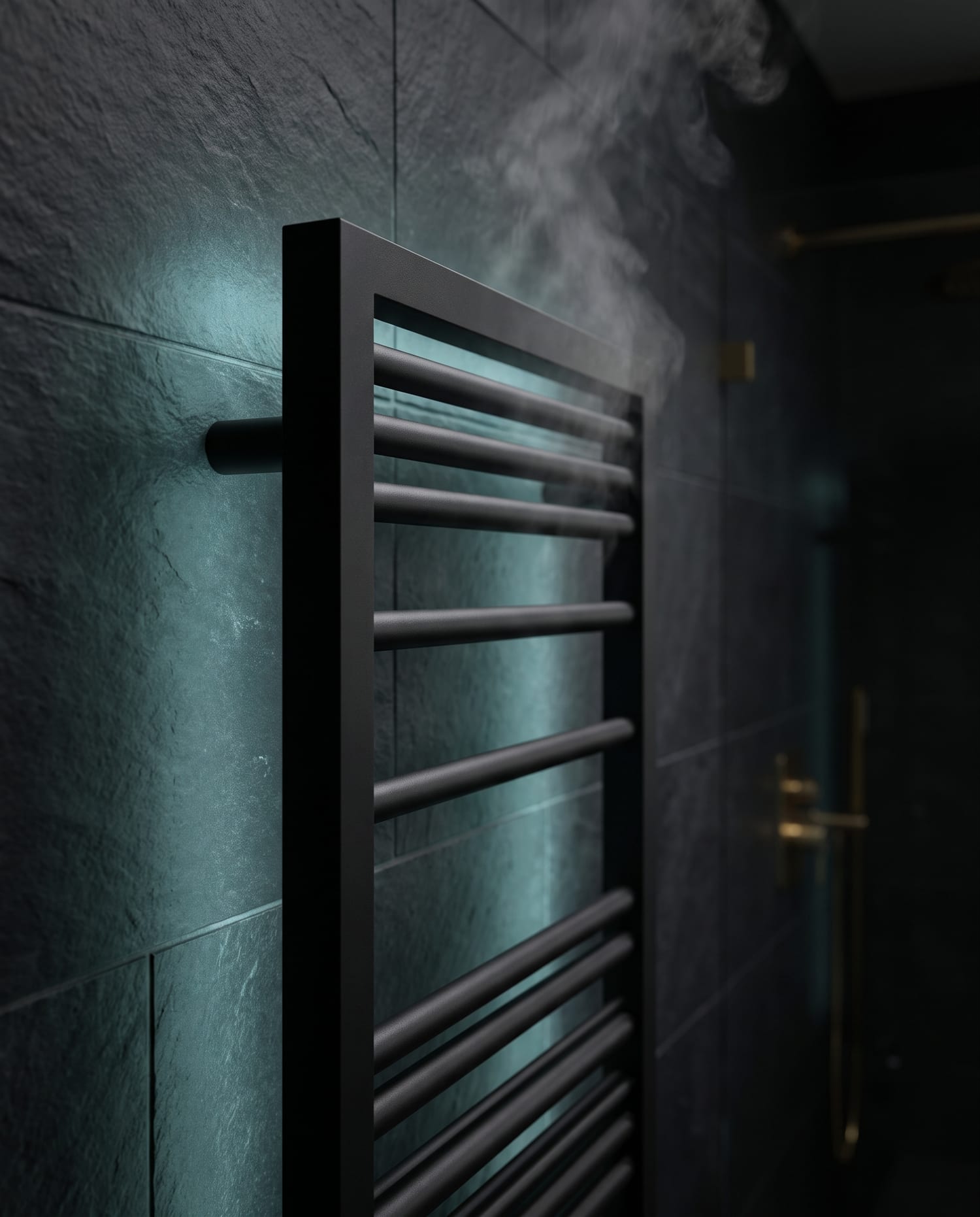 A designer towel radiator on a slate wall